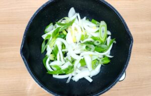 Onion layered at bottom of pan for dubu jorim