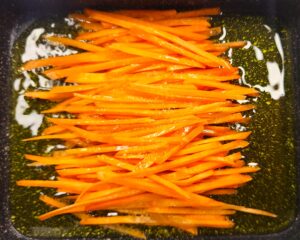 julienned carrot stir-fried in oil for mini kimbap filling